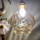 Suspension globe vintage en verre ambré