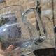 Vintage blown glass pitcher with bubbles, transparent.