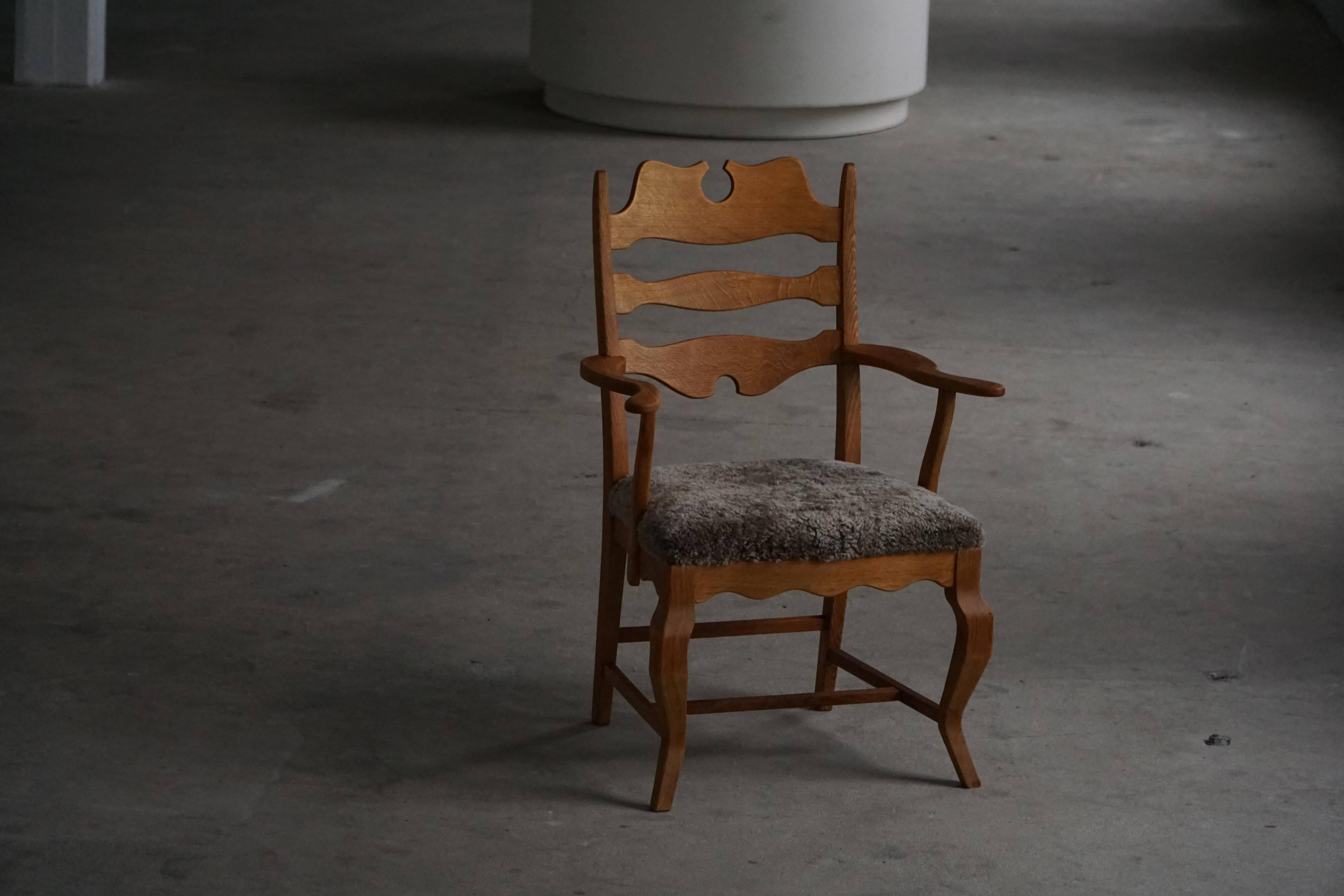 Razorblade armchair from the mid-20th century by Henning Kjærnulf, oak and lambswool, 1960.