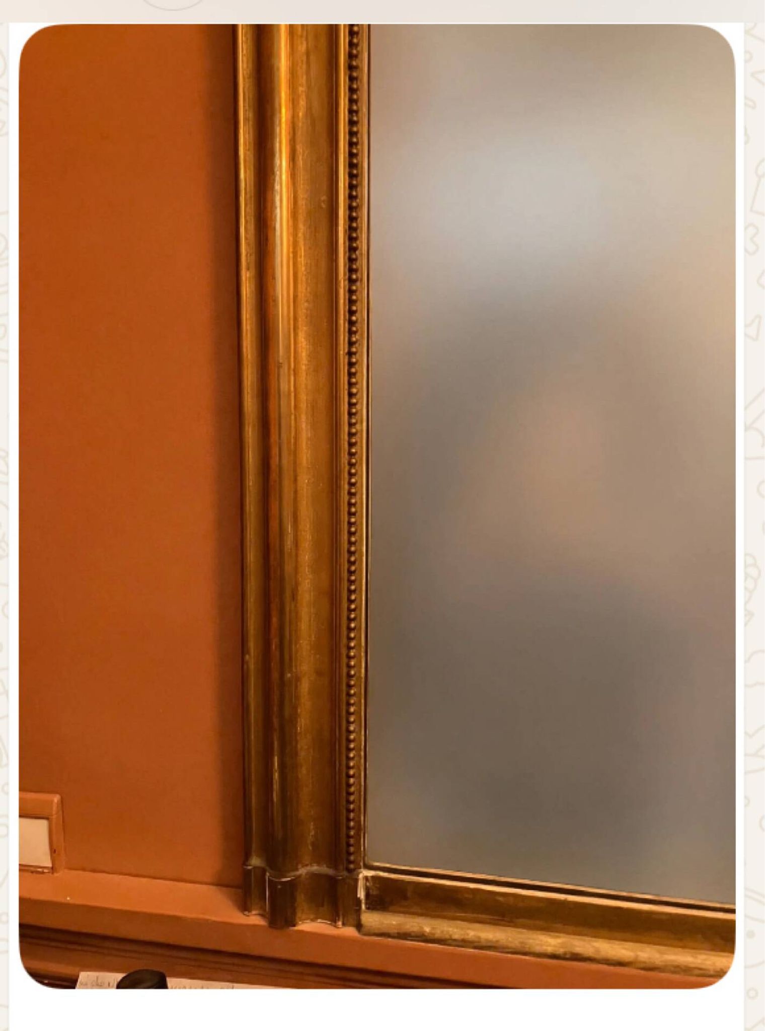 Antique gilded wooden mirror
