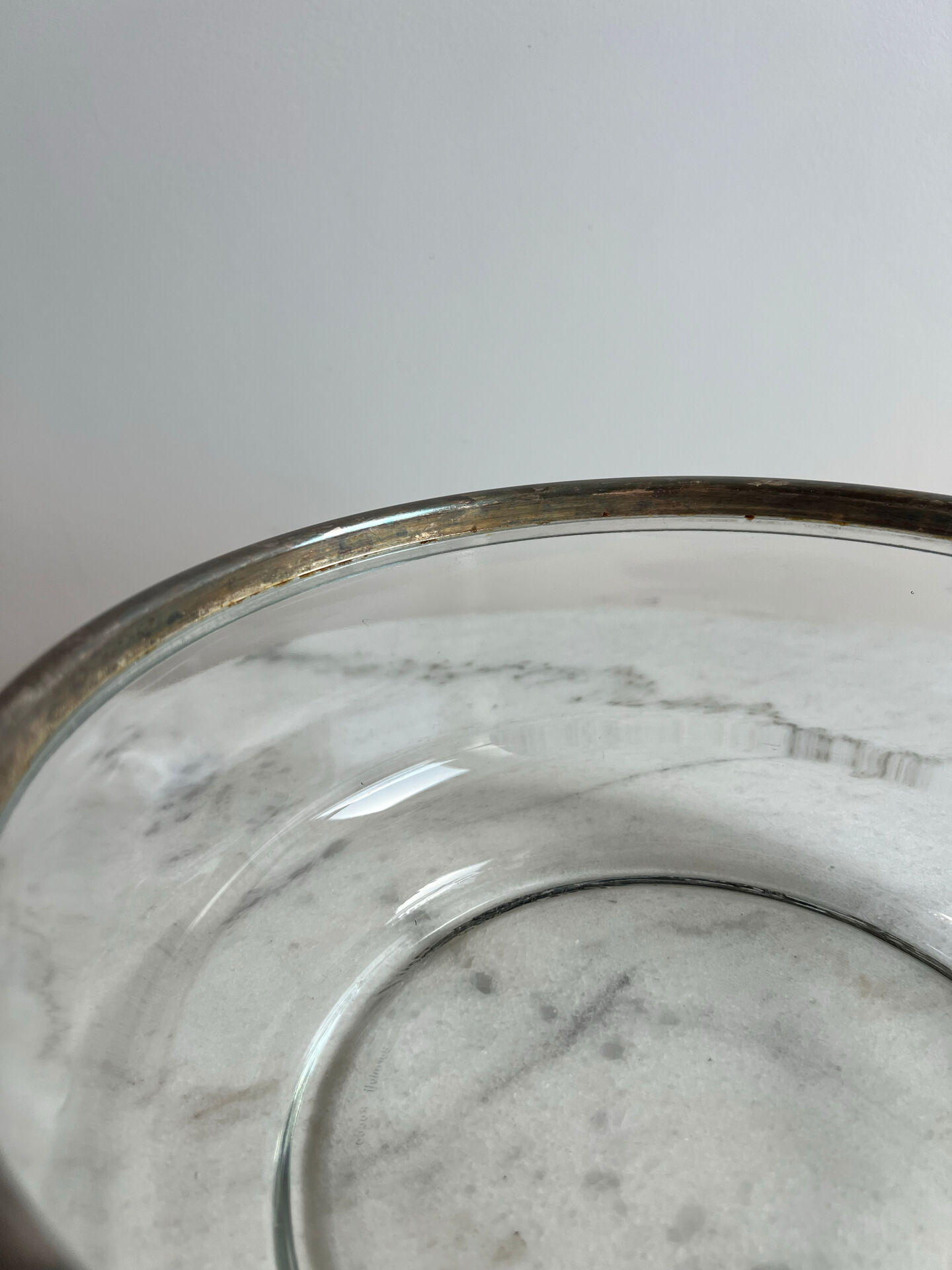 Glass and silver-plated metal salad bowl, silver rim.