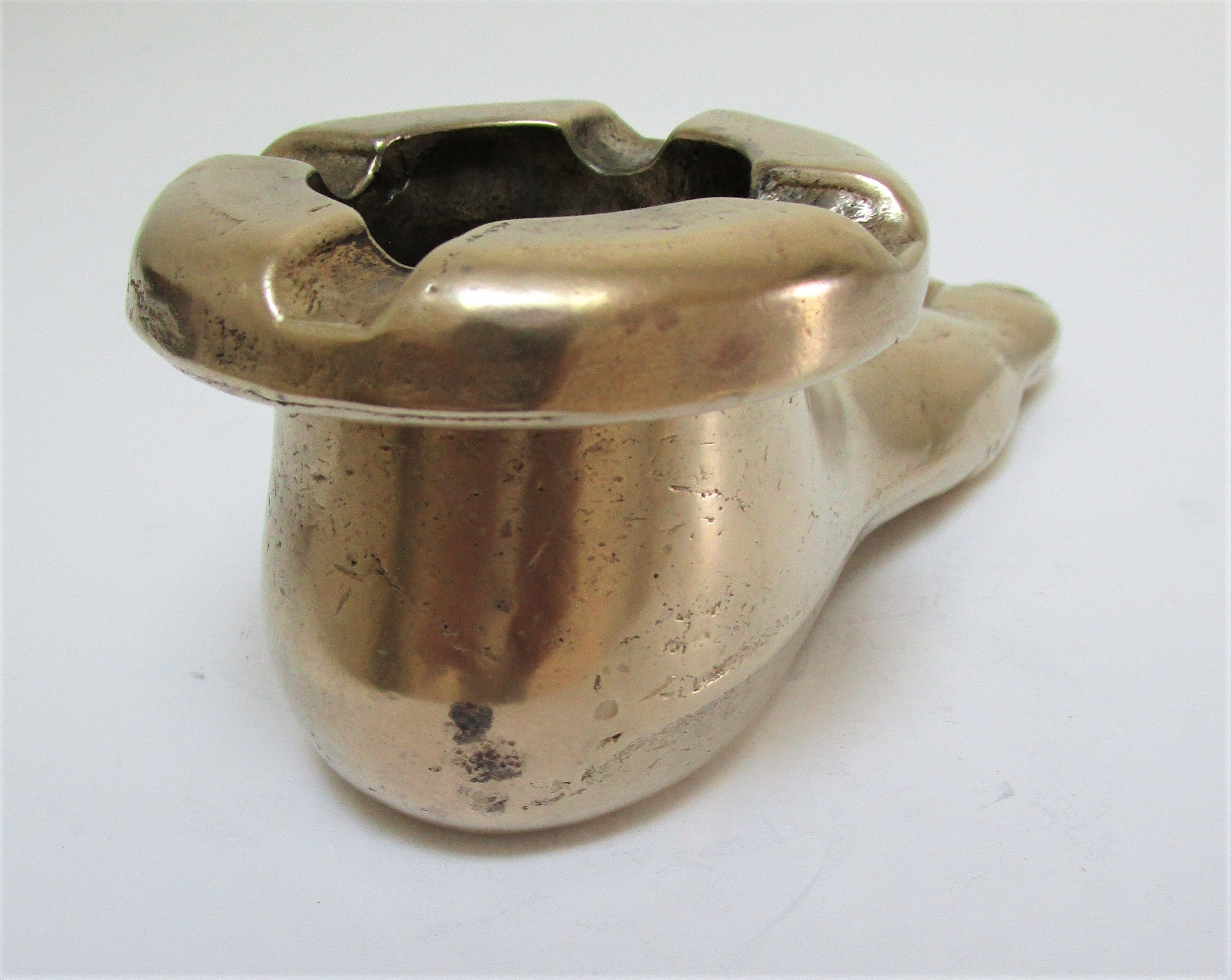 Anthropomorphic ashtray solid brass foot design 70s