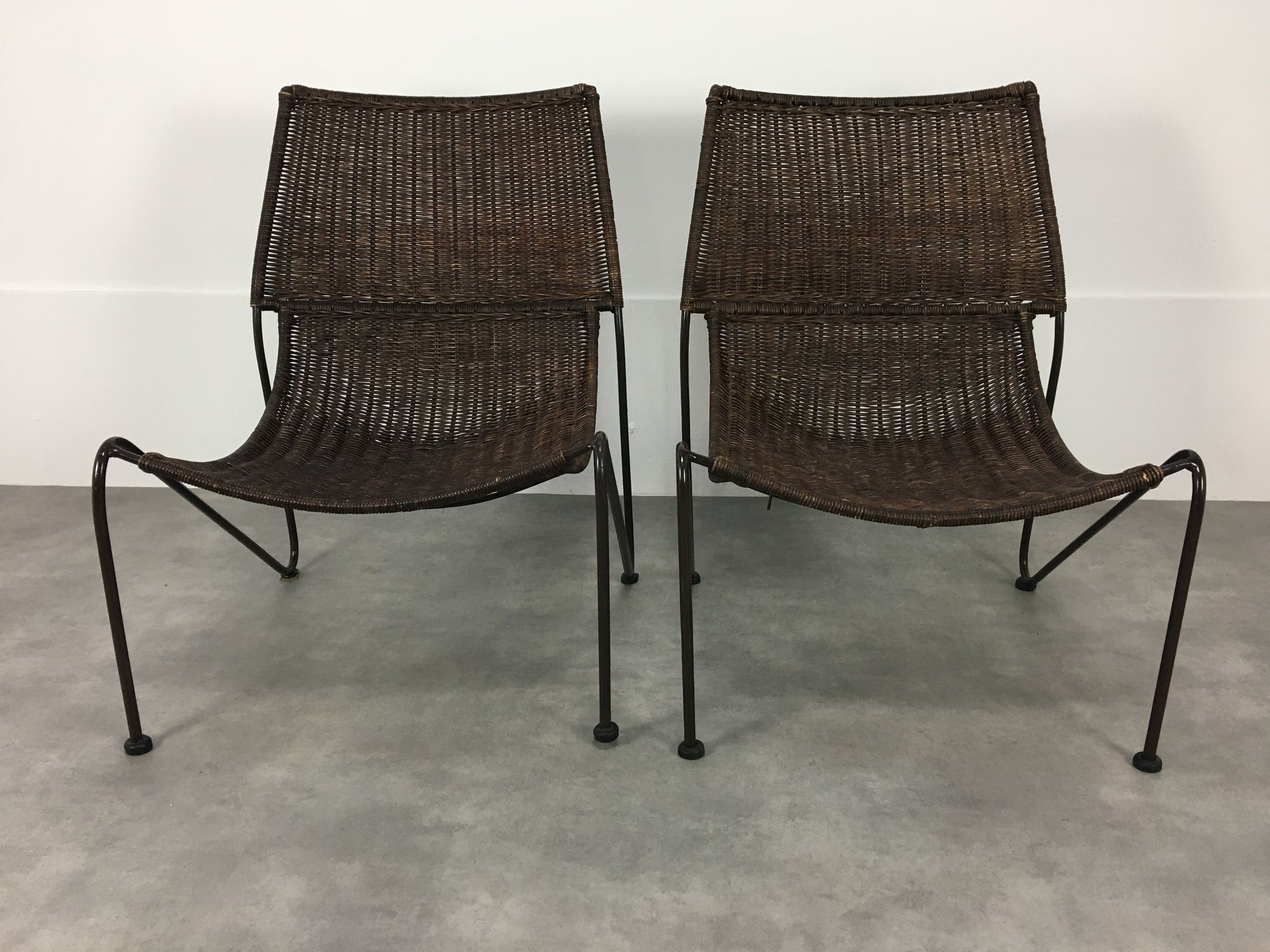 Pair of rattan and steel wire armchairs by frederick weinberg