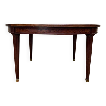 Extendable oval table in Louis XVI style – Mottled mahogany – 19th century
