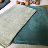 Suite of four tinted antique napkins