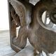 Gothic bench made of solid wood, heads of carved grotesques