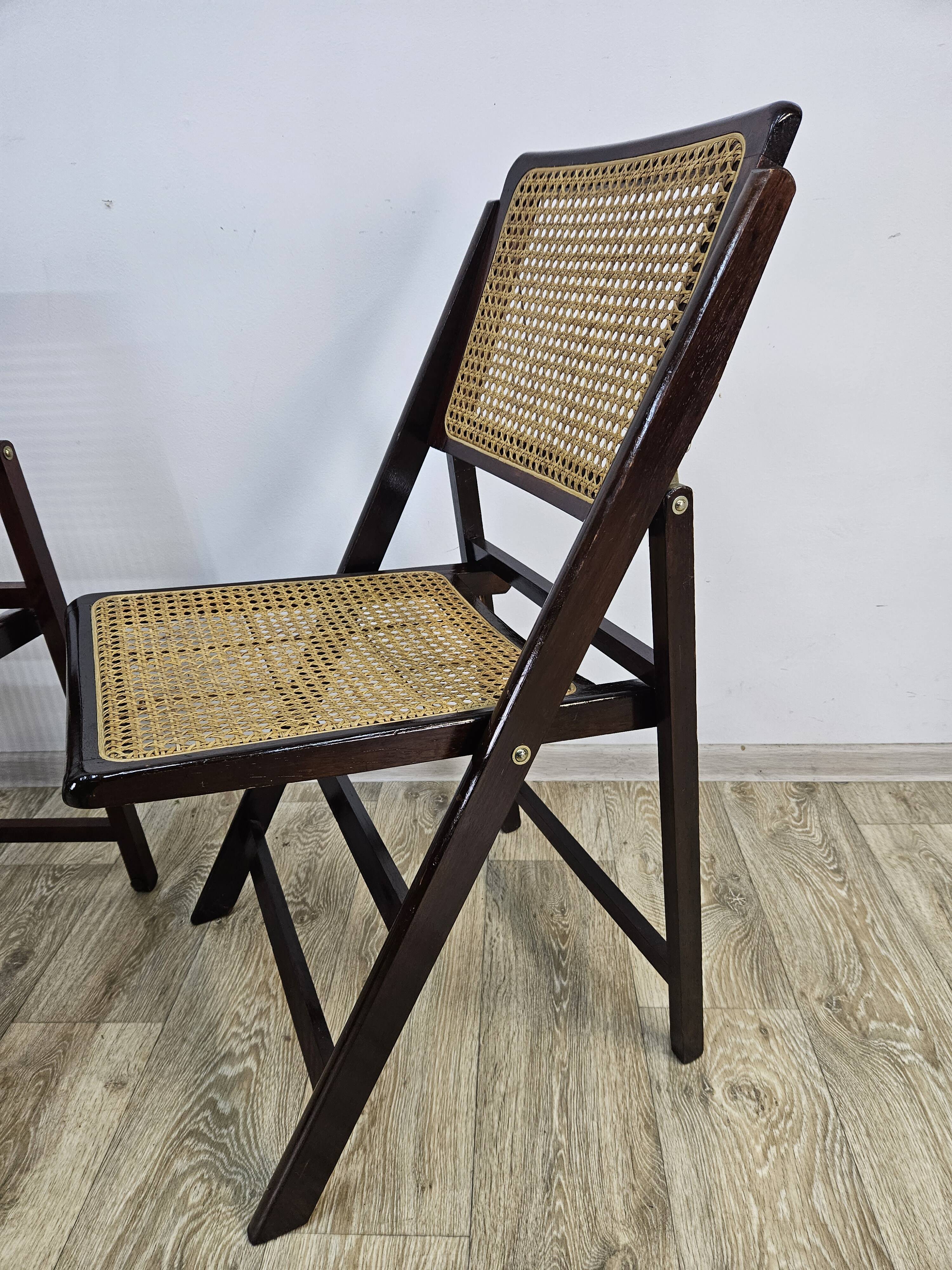 Folding wooden chairs with raffia, 1970s.
