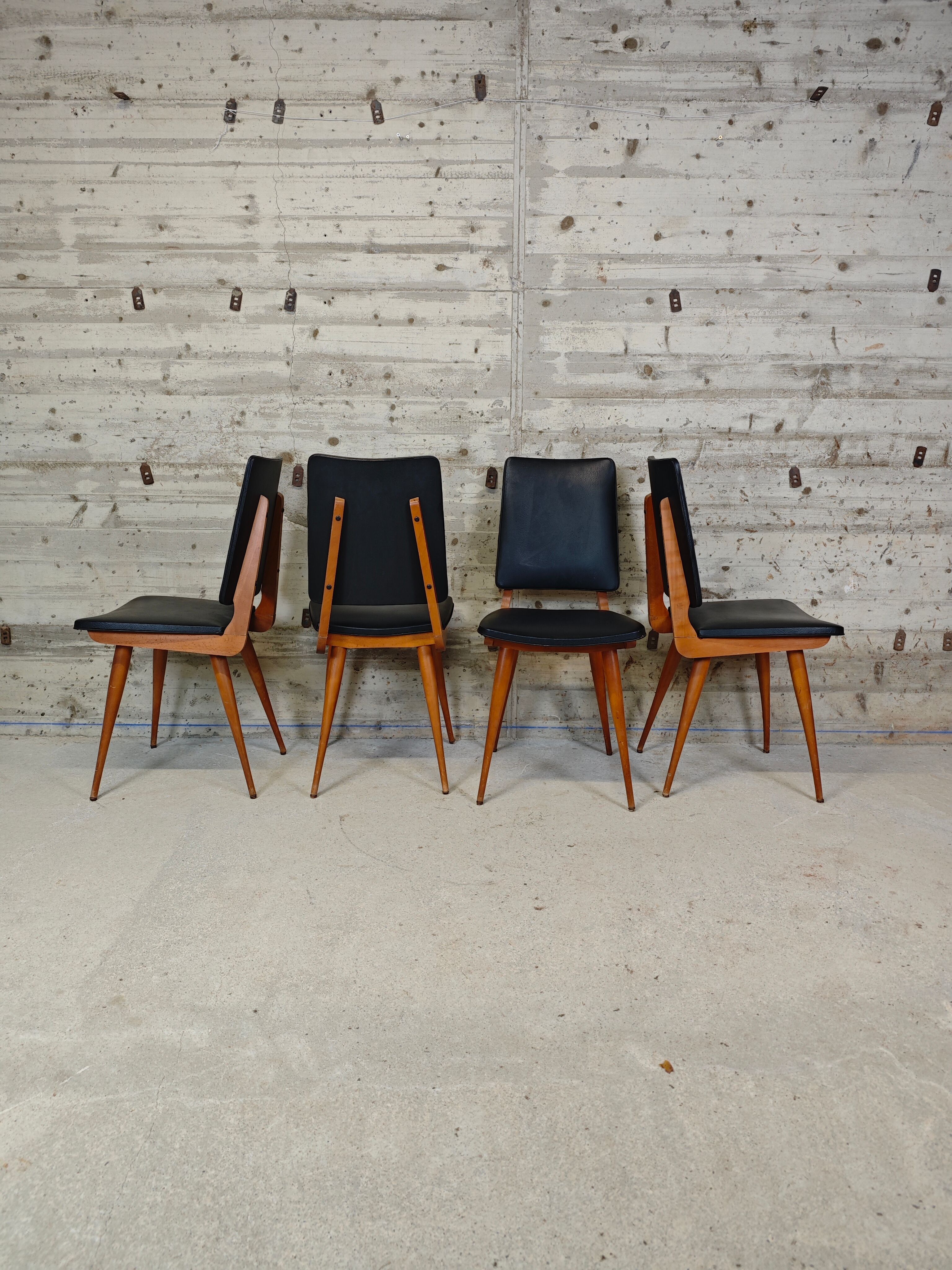 Set of 4 vintage chairs with tapered legs.