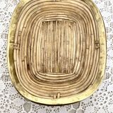 Empty rattan and brass pocket