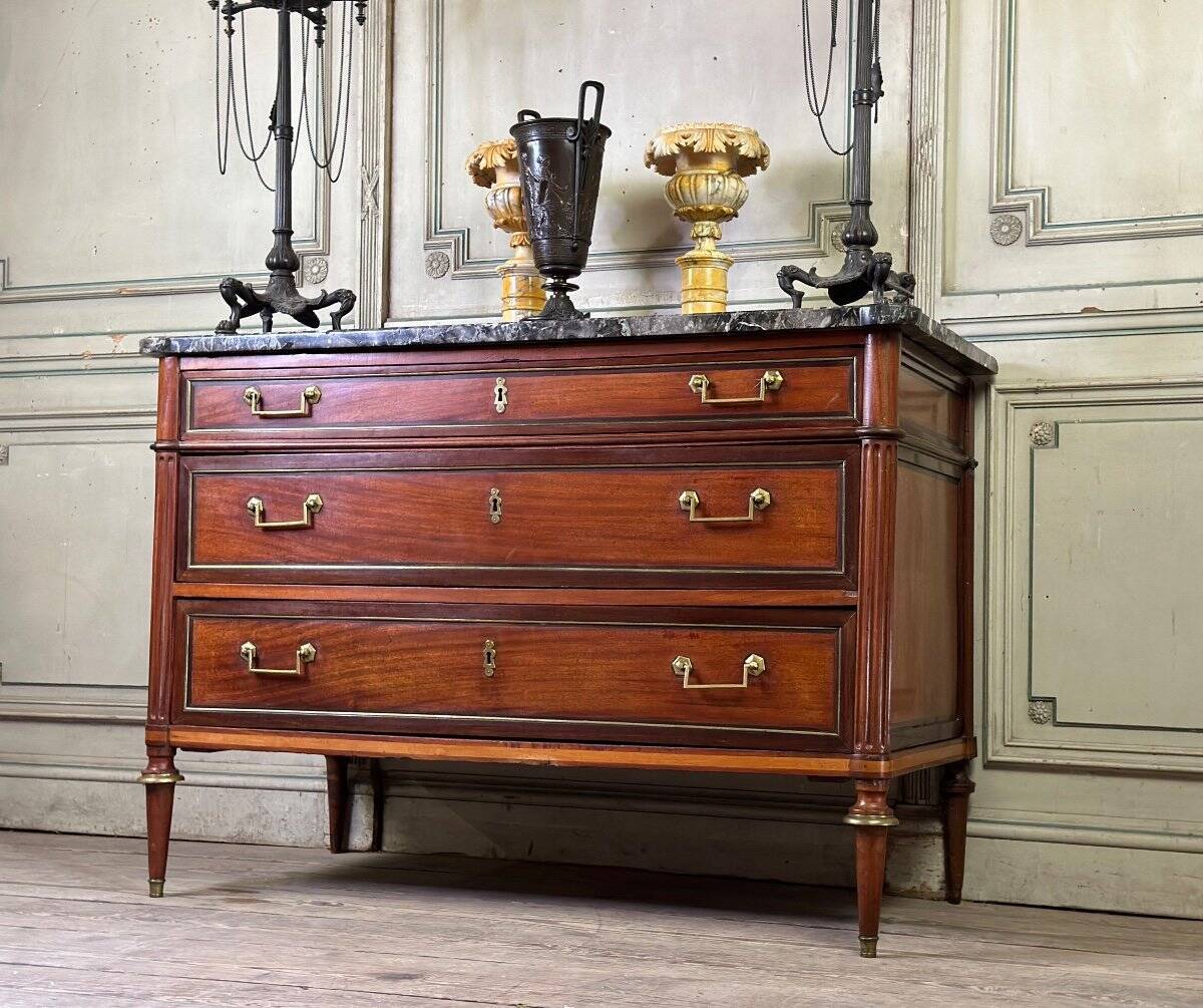 Louis XVI style mahogany commode in three colors, 18th century