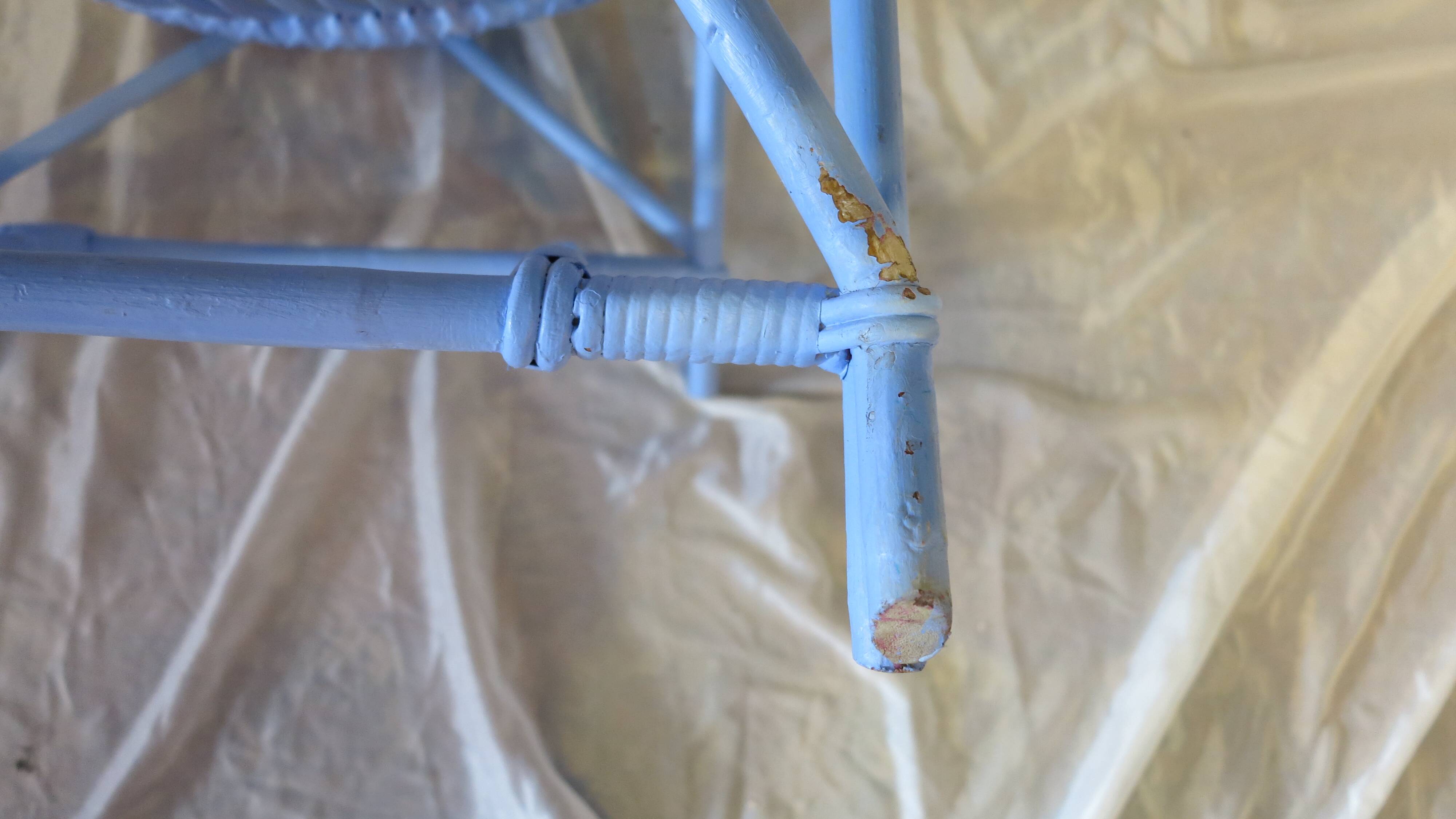 Blue painted rattan armchair