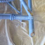 Blue painted rattan armchair