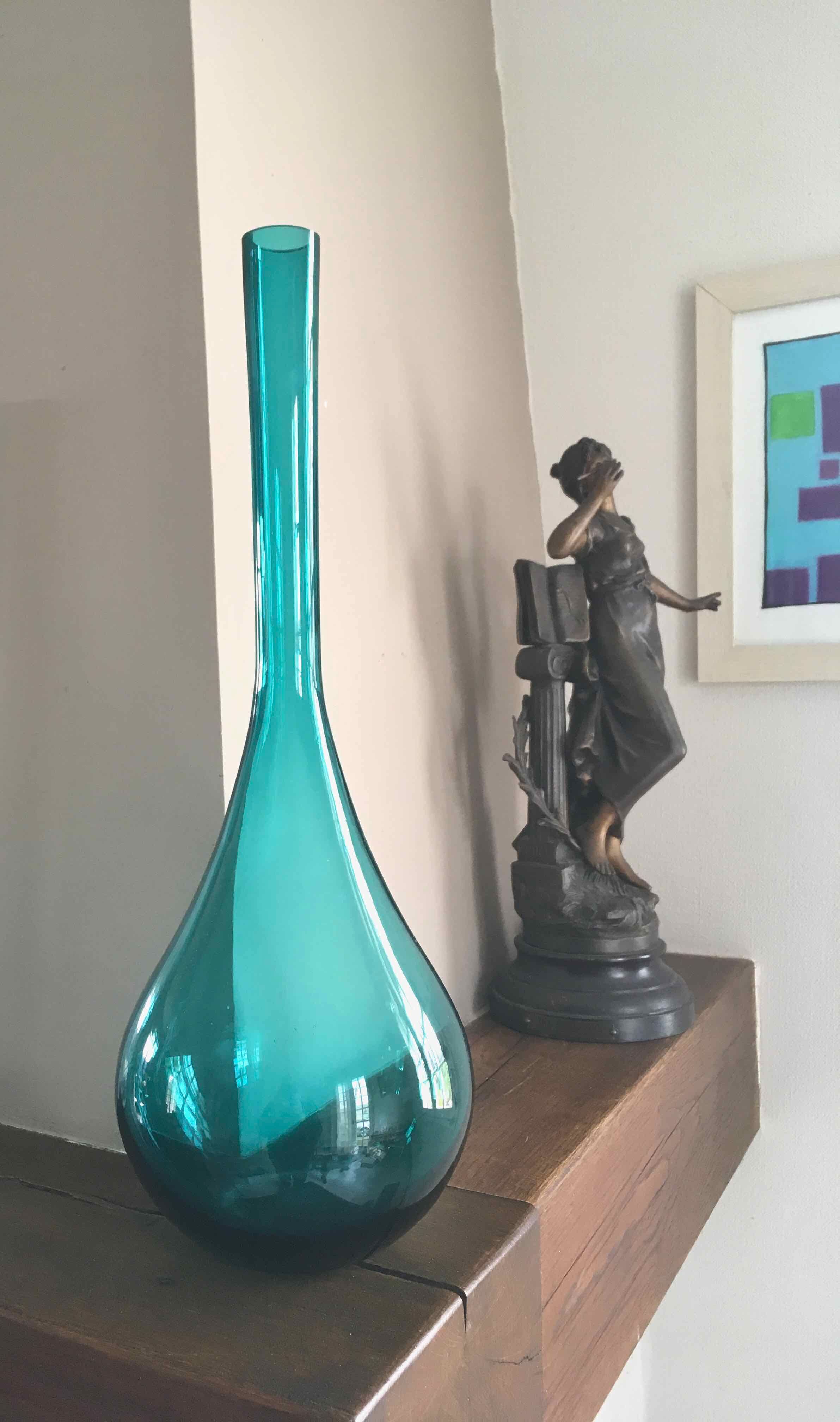 Large blown glass bottle