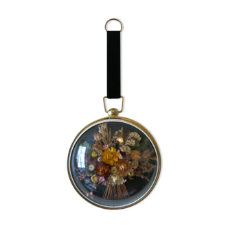 Vintage medallion of dried flowers decorative frame in domed glass and brass