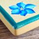 Yellow glazed ceramic trivet signed l. drimmer