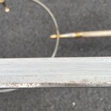 Coffee table in gilded brass and veined green marble
