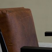 Modernist Dutch lounge chair in enamelled steel and leather from the 1950s.