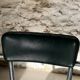 Pair of green vinyl and chrome armchairs, mid-century