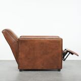 Comfortable and adjustable sheepskin relax armchair with a sleek design