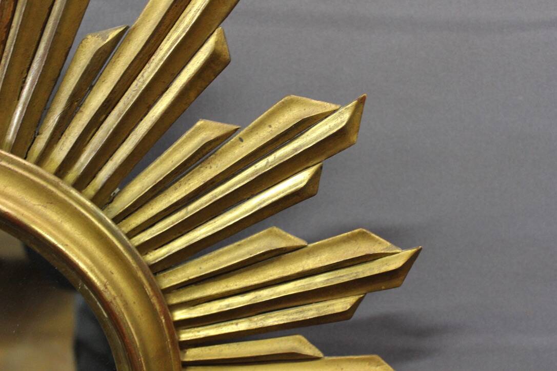 Sun mirror in gilded wood circa 1970
