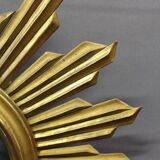 Sun mirror in gilded wood circa 1970