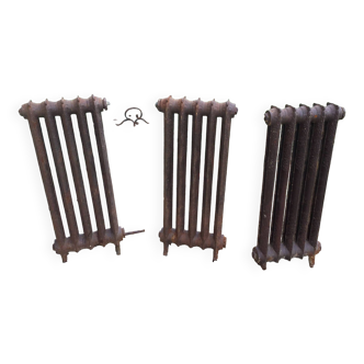 Set of 3 old cast iron flower radiators