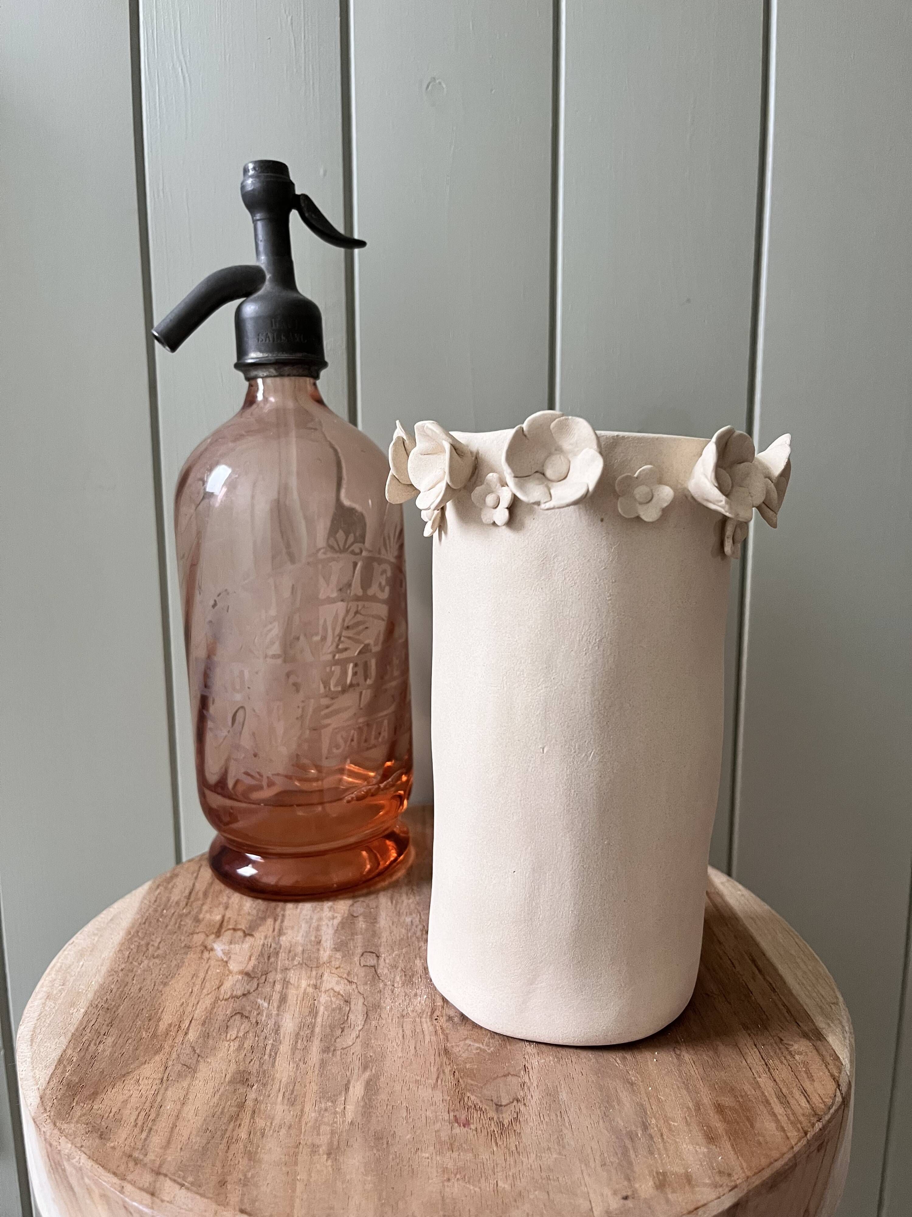 Stoneware vase with relief flowers