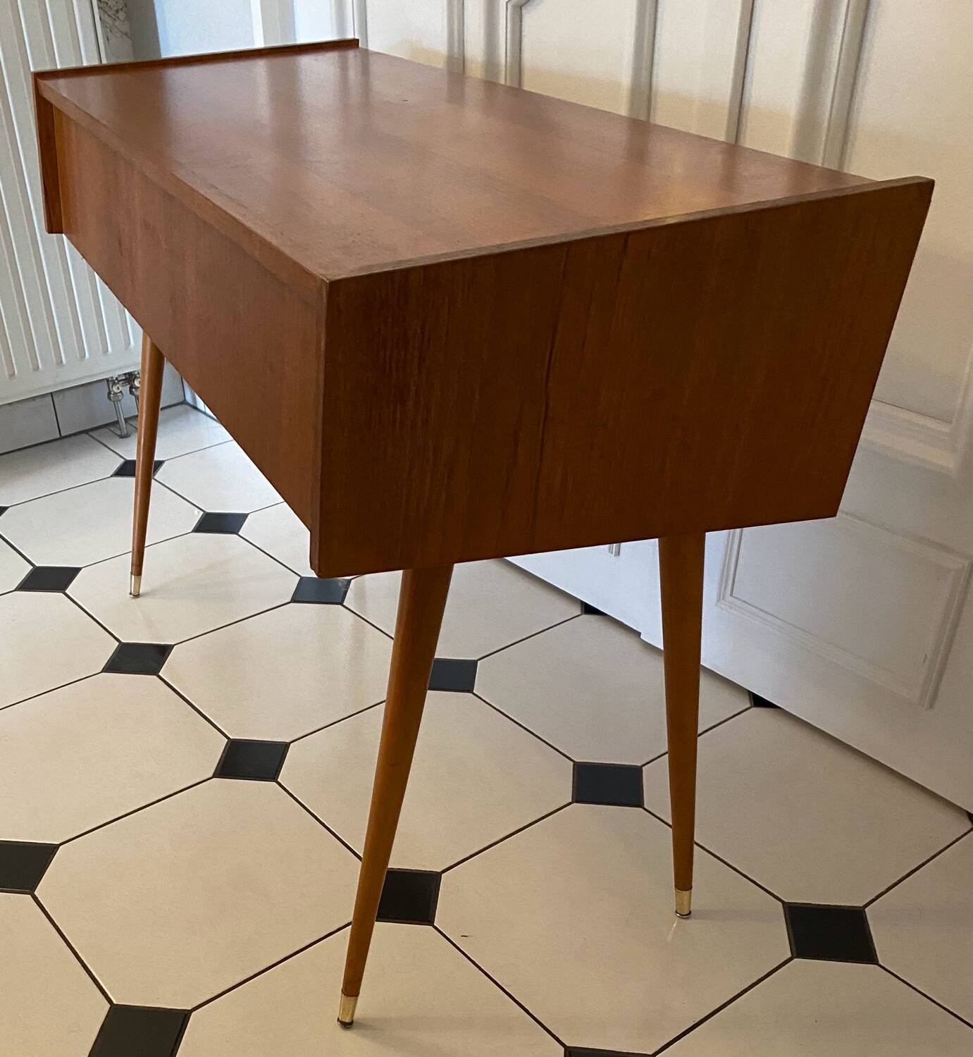 Vintage console with compass feet