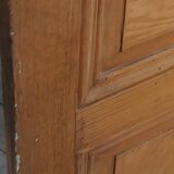 Old communication door with wood effect paint
