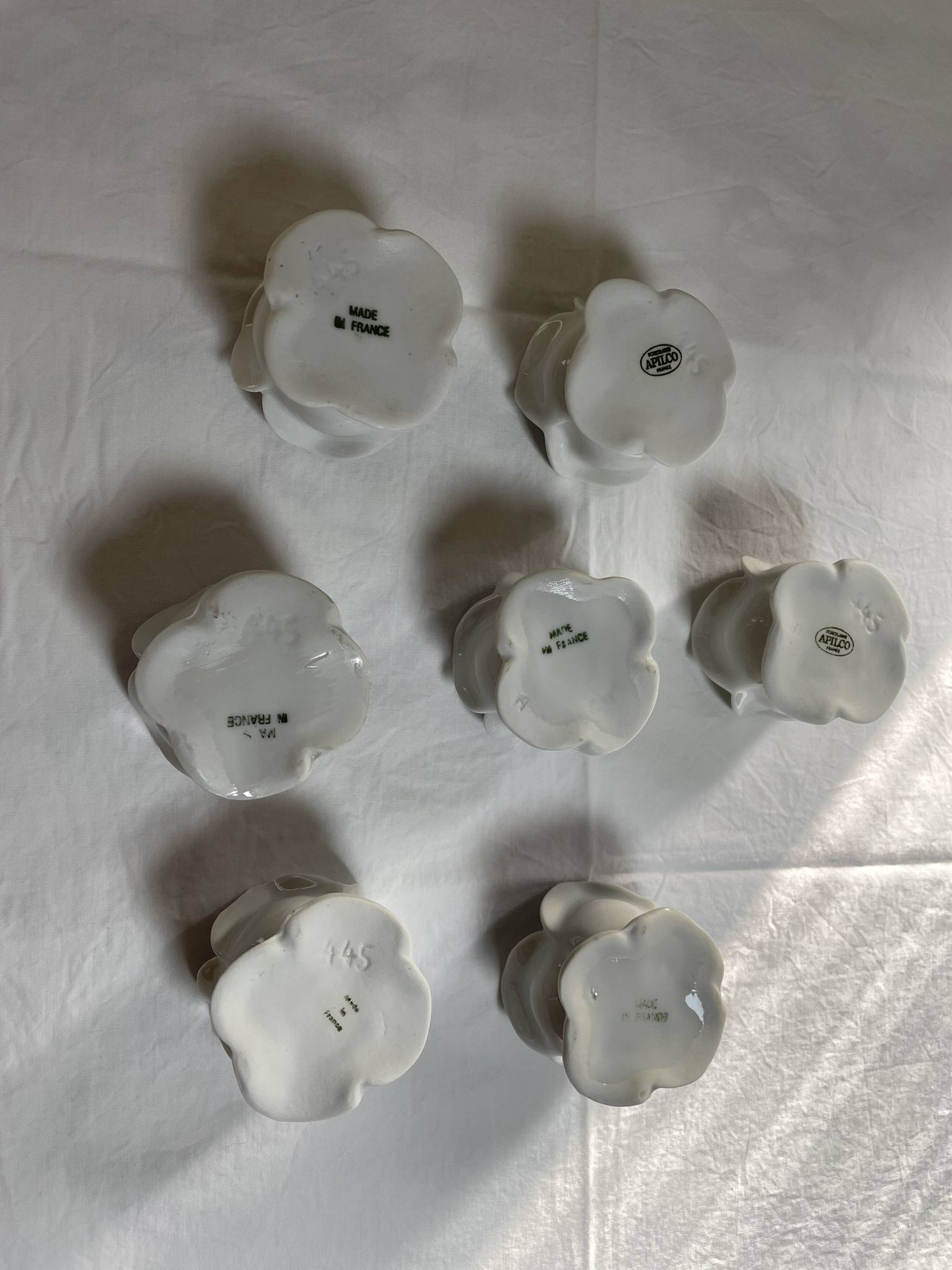 White porcelain rose shaped candle holders