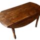Round (foldable) table in solid wood (walnut)