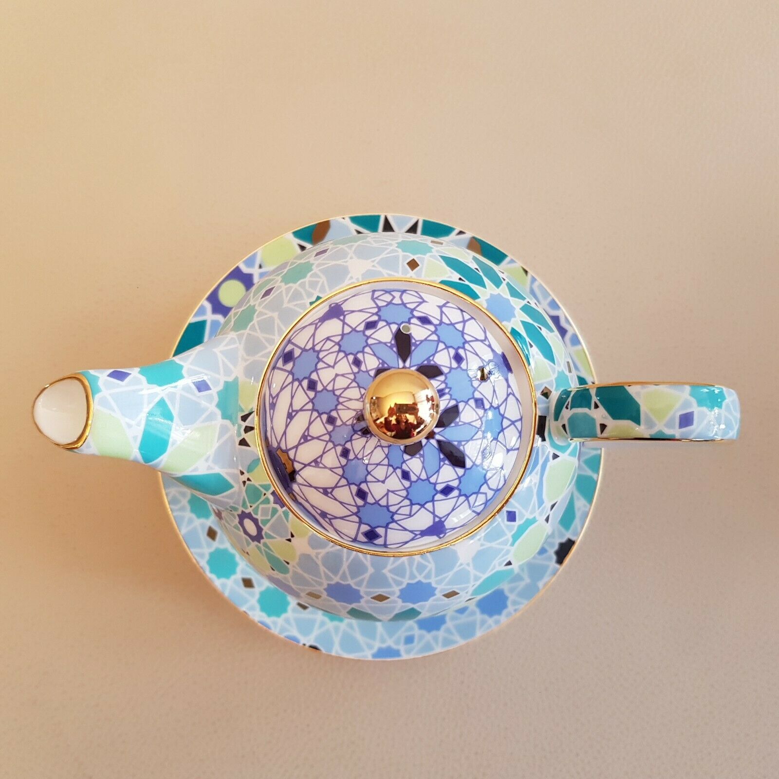 Teapot geometric decoration blue golden green
