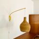 Adjustable Brass and Wicker Arc Sconce