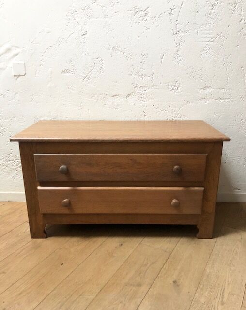 Low oak chest of drawers