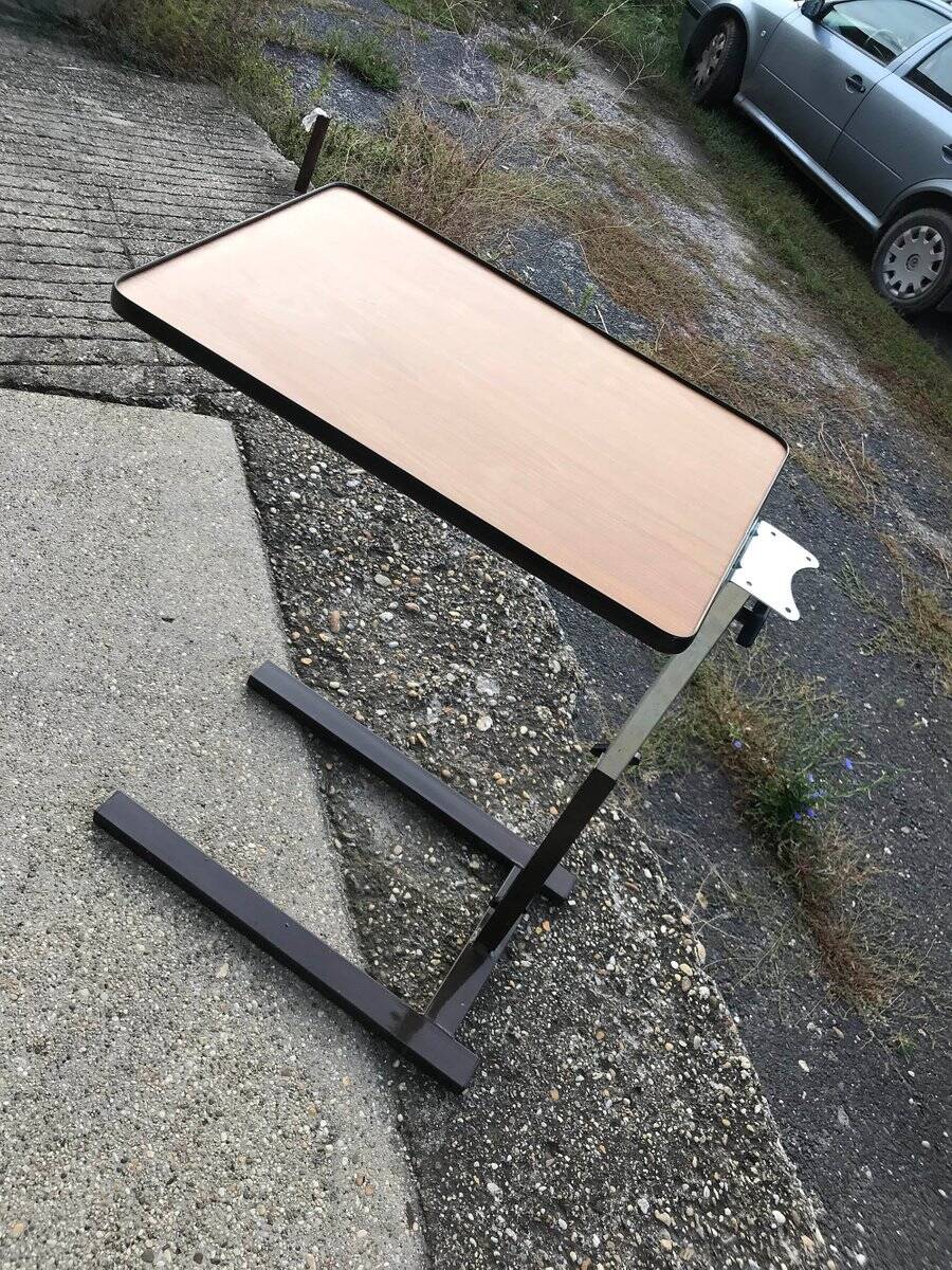 Extendable vintage desk from the 1960s, brown wood and metal structure, practical mid-century design.
