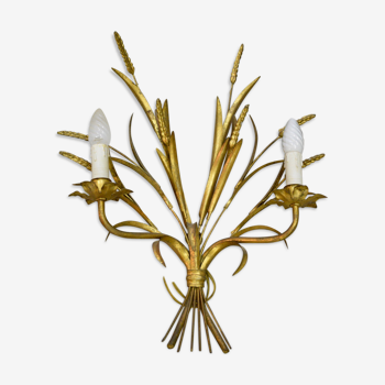 Sconce in golden iron