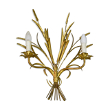 Sconce in golden iron