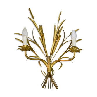 Sconce in golden iron