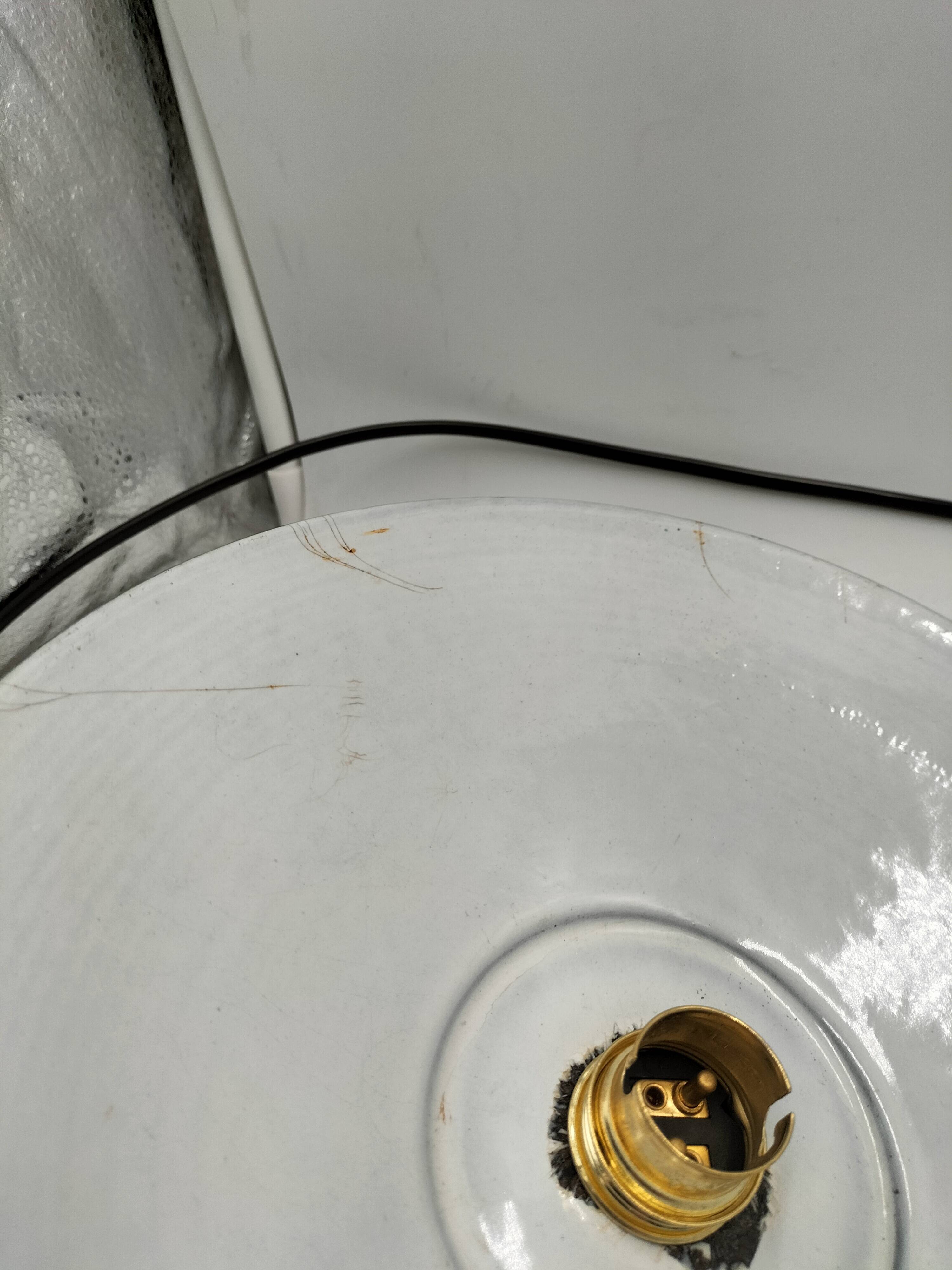 Enamelled sheet metal suspensions