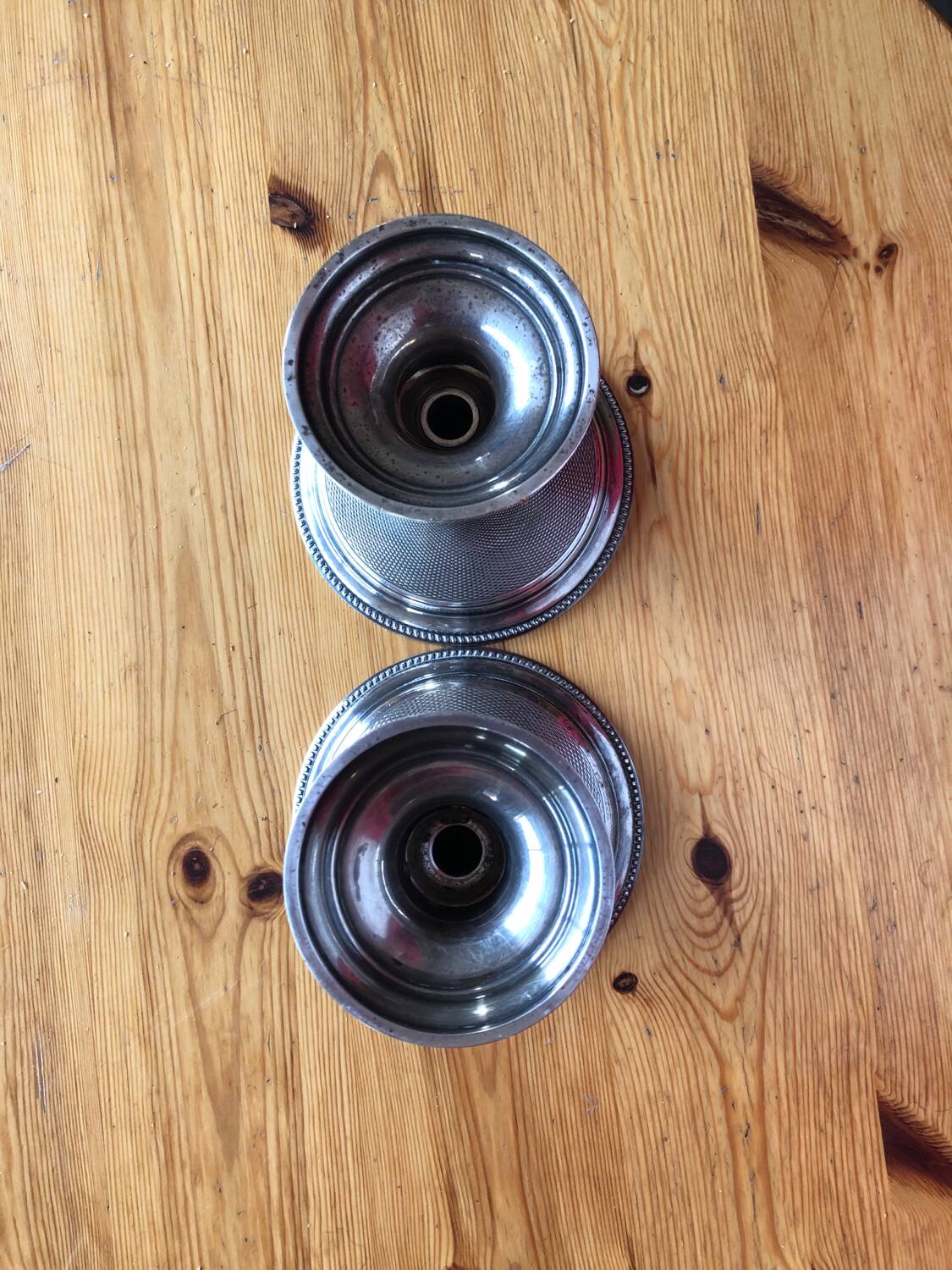 Silver candlesticks by TH HENRY