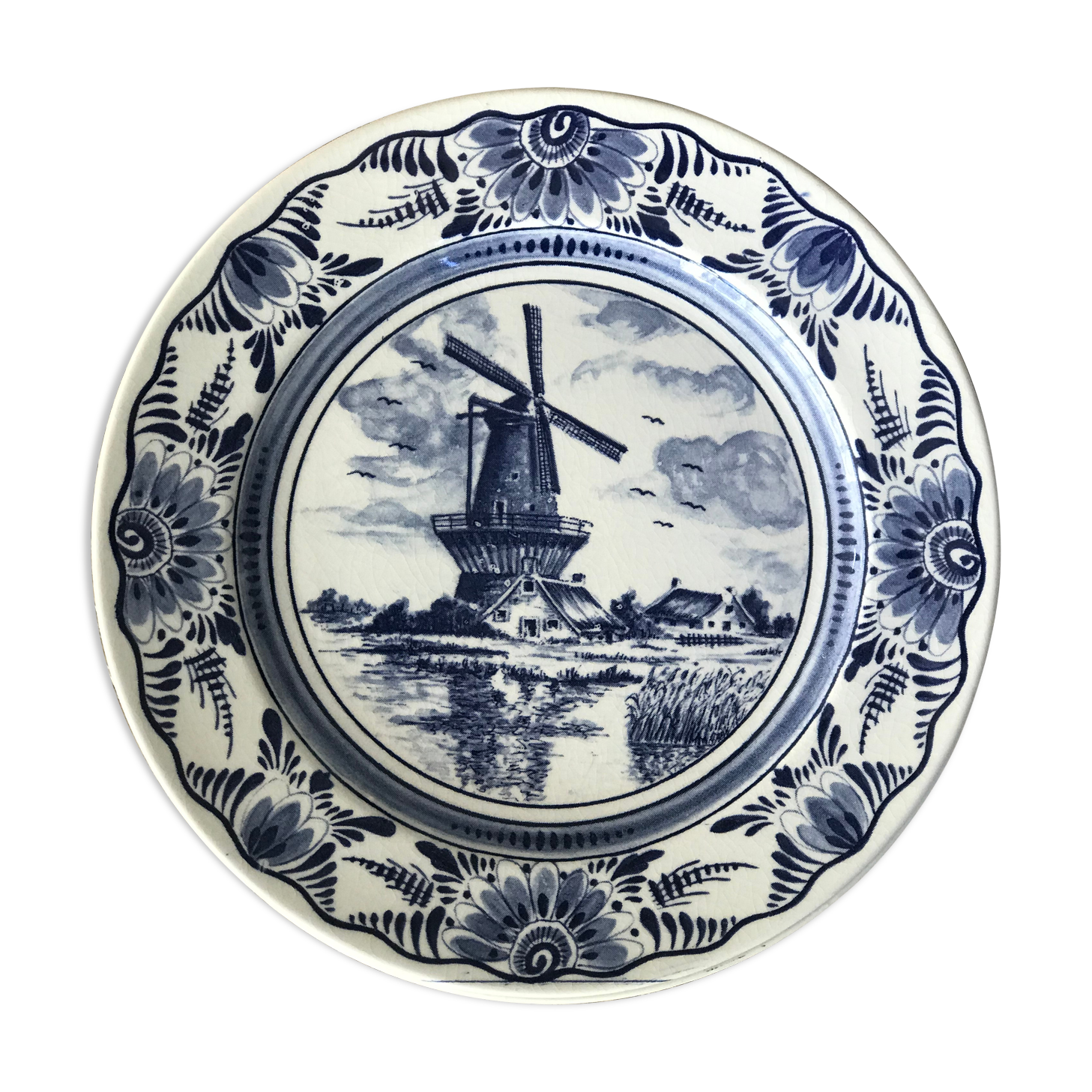 Lot of 4 dessert plates in white porcelain and Dutch mill design