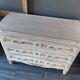 Louis XV style royal chest of drawers patinated