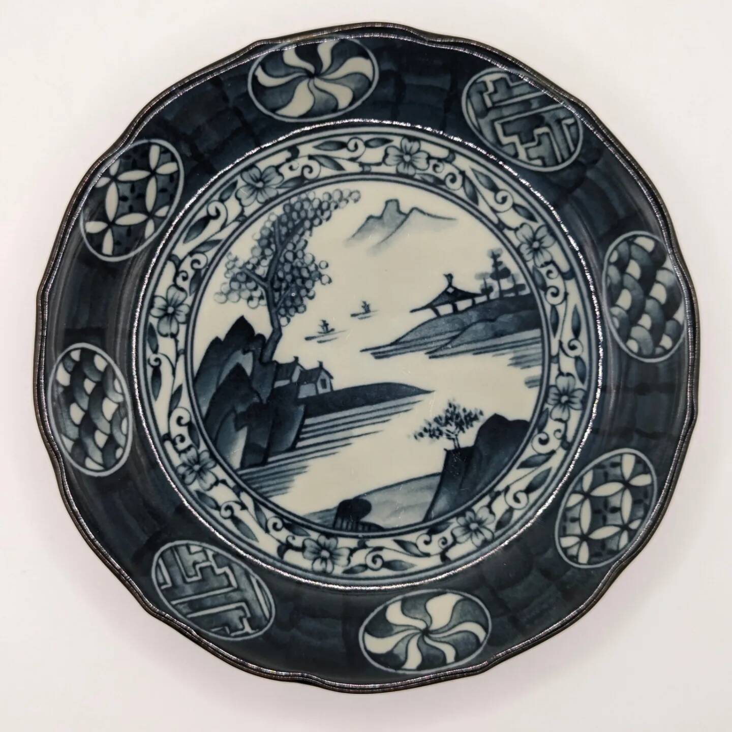 Old signed blue ceramic plate with landscape decoration, Japan