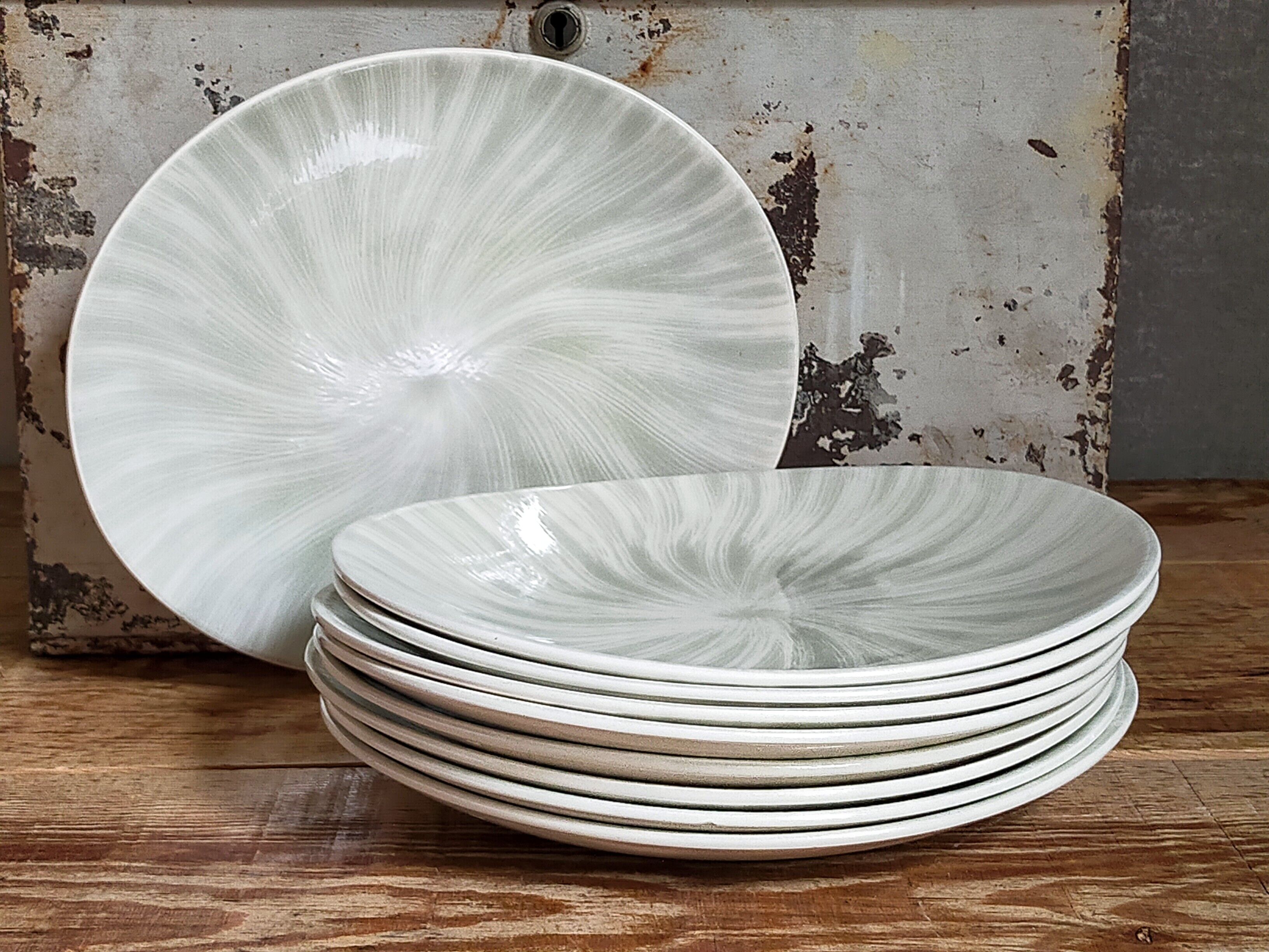 Nine earthenware plates from Salins-les-Bains vintage