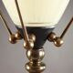 Lampadaire tripode de forme réverbère en fer et verre