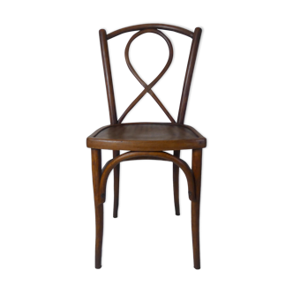 Old curved wooden bistro chair