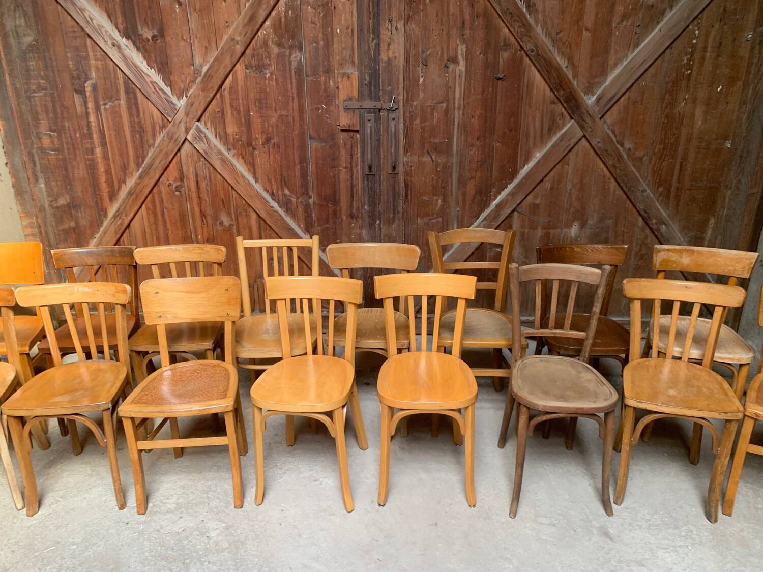 Series of 20 vintage mismatched bentwood bistro chairs