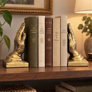 Paire de serre-livres vintage en bronze formant mains en prière dorées