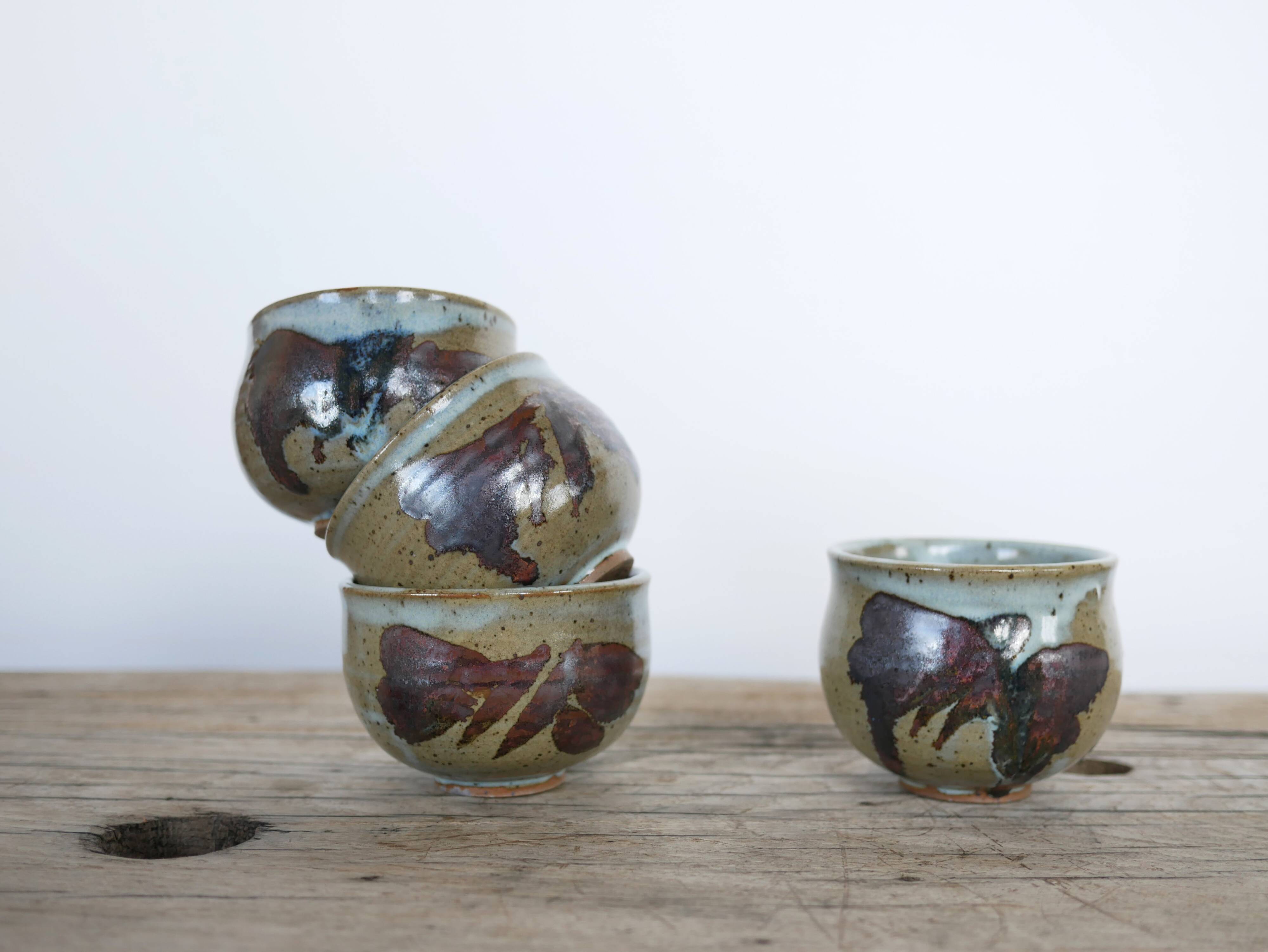 Series of 5 vintage stoneware cups