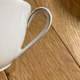 5 porcelain cups and sub-cups